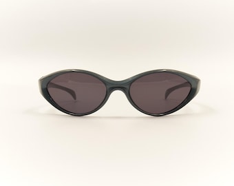May include: A pair of dark gray oval-shaped sunglasses with a thin black frame.