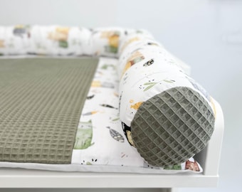 Cotton kitty print changing pad with long pillow and baskets, nursery room changing top mat