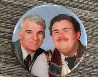 PLANES TRAINS AUTOMOBILES Steve Martin John Candy 1.25&quot; Button Pin Badge Neil Page & Del Griffith