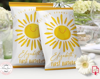 May include: Two white chip bags with a yellow border. Each bag features a yellow sun with a smiling face and the text "First Trip Around The Sun" and "Elizabeth's First Birthday".