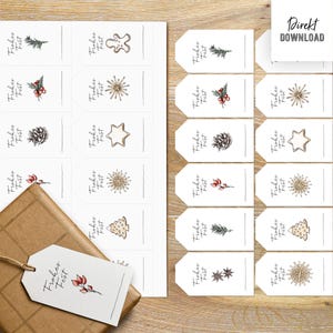Könnte beinhalten: Weiße Geschenkanhänger mit weihnachtlichen Illustrationen wie Tannenbaum, Lebkuchenmann und Stern, mit dem Schriftzug "Frohes Fest". Ein verpacktes Geschenk mit passendem Anhänger ist ebenfalls zu sehen. Das Bild enthält auch ein "Direkt DOWNLOAD" Zeichen.