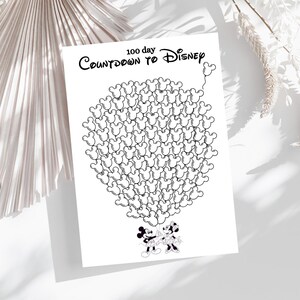 May include: A printable 100-day countdown to Disney. The design features a circle of Mickey Mouse ears, with Mickey and Minnie Mouse at the bottom.