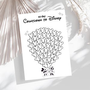 Könnte beinhalten: Ein druckbarer 50-Tage-Countdown zu Disney mit Mickey Mouse und Minnie Mouse, die Ballons in Form von Mickey Mouse-Ohren halten.