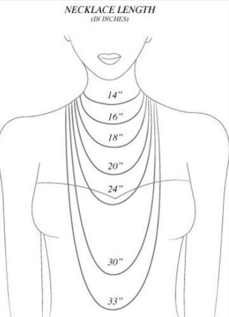 May include: A line drawing of a woman's torso showing different necklace lengths in inches, from 14 inches to 33 inches.