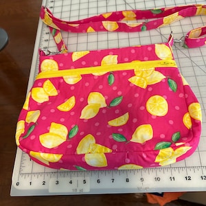 Pink and yellow crossbody bag