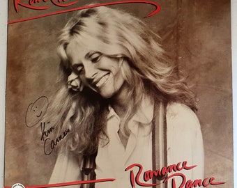 Álbum autografiado "Romance Dance" de Kim Carnes, COA #KC96475