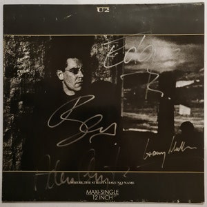 U2 Autographed &#39;12 inch&#39; Album COA #UT67472