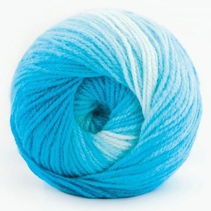 May include: A ball of blue and white ombre yarn. The yarn is soft and fluffy, and it is perfect for knitting or crocheting.