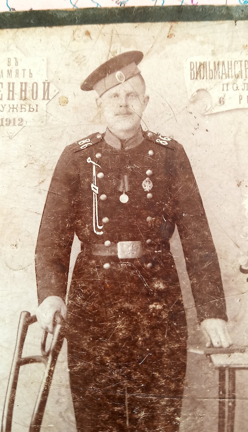 Old photo of a military soldier.Photo of military service.VILMANSTRANDSKY regiment of the 6th company.Old photo,vintage card,photo soldier.