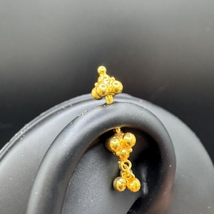Piercing Karnataka Bugudi pendente in oro 18k