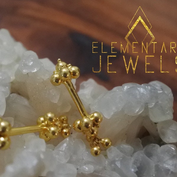 Piercing Karnataka Bugudi pendants en or 18 carats