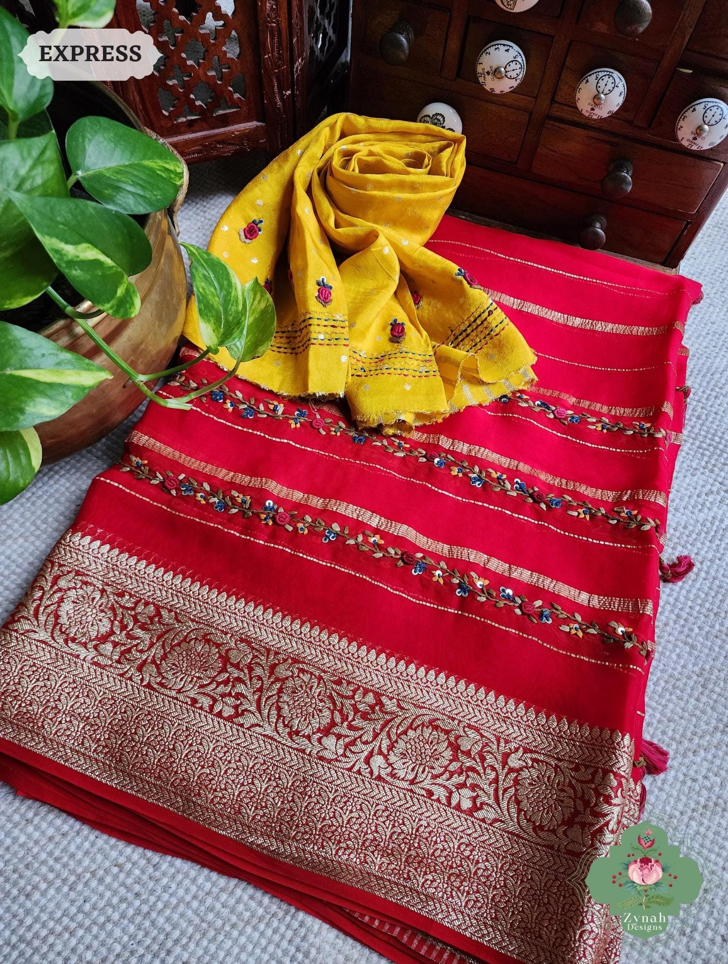Red Organza Crepe Silk Saree With Zari Borders & Stripes, French Knot Hand Embroidery;Timeless Sarees For Women by Zynah; SKU: 0710202404