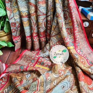 Zynah Powder Blue & Red Organic Linen Saree With Kalamkari Print, stitched readymade blouse,fall,petticoat, SKU:2610202301