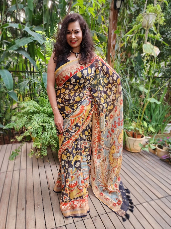 linen saree with kalamkari blouse