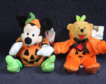 Choice: The Disney Store Halloween Mickey Mouse in Pumpkin Costume OR Disney Store Winnie The Pooh Halloween Pumpkin Costume Plush D1