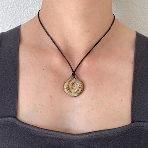Adjustable black cord necklace with watercolor bronze rust green circle swirl shell abstract wavy ceramic pendant