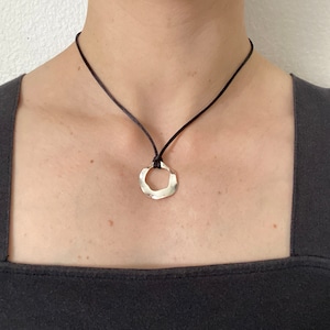 Silver open circle wavy irregular pendant black adjustable cord necklace