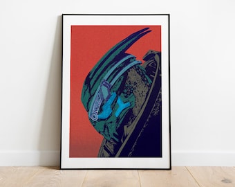 May include: Framed art print featuring a stylized illustration of a Predator helmet. The artwork uses a limited color palette of green, blue, and black against a red background. The print is displayed in a black frame.