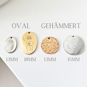 May include: Four different metal pendant charms, two oval and two round. The oval charms are 18 mm and 13 mm. The round charms are 13 mm and 15 mm. The charms are engraved with different designs, including a flower, a fingerprint, a hammered texture, and a heart with initials.