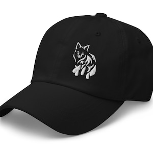 May include: A black baseball cap featuring an embroidered white graphic of a stylized fox on the front panel. The cap has a curved brim, a button on the top, and stitched eyelets for ventilation, presenting a clean and simple design.