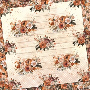 May include: A seamless pattern featuring a repeating design of orange, brown, and white floral bouquets on a light brown woodgrain background with white polka dots.