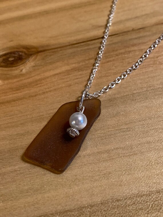 Brown Beach Glass With A Pearl Charm