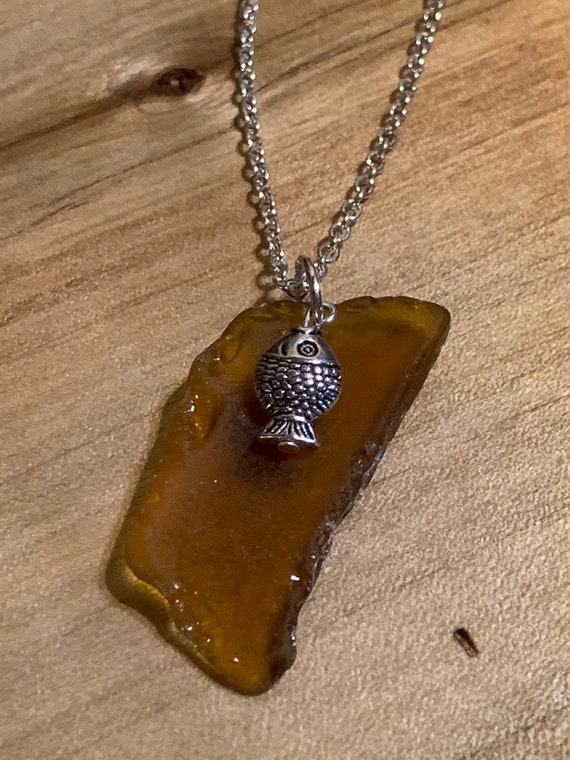 Brown Beach Glass With A Fish Charm