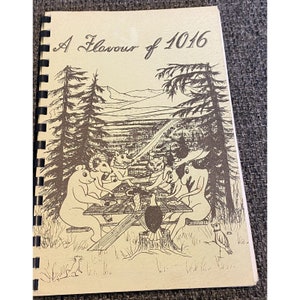 May include: A vintage cookbook with a brown cover and a hand-drawn illustration of animals having a picnic in the woods. The title of the book is "A Flavour of 1016".