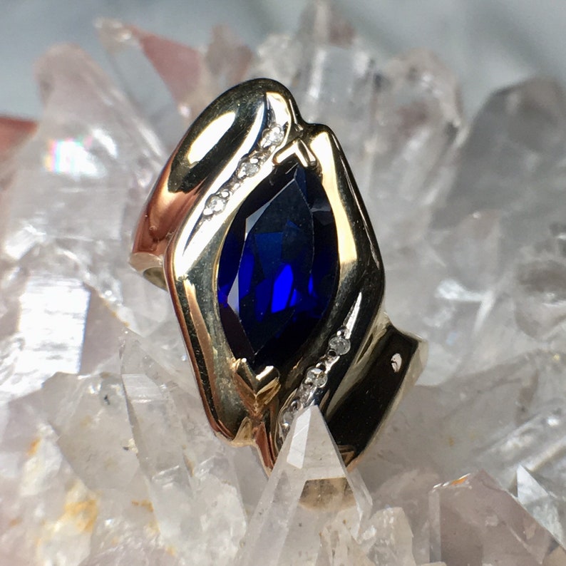 Stamped 10k XPS 2g Size 5 34 ? Beautiful Deep Blue Stone Vintage Lab Sapphire and Diamond Accents Yellow Gold Ring