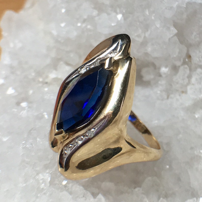 Stamped 10k XPS 2g Size 5 34 ? Beautiful Deep Blue Stone Vintage Lab Sapphire and Diamond Accents Yellow Gold Ring