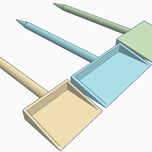 May include: Three miniature dustpans with wooden handles. The dustpans are beige, light blue, and light green.