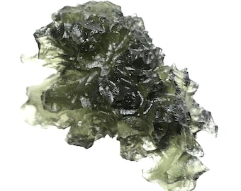 May include: A translucent, olive-green moldavite gemstone with a rough, textured surface. The natural stone has an irregular shape and is set against a white background. The gemstone is a unique piece of natural jewelry.