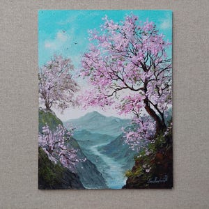 Spring cherry tree Mountain Original Art. Impasto Sakura landscape high-quality oil painting. In the top of the mountain bloom pink sakura.