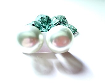 Large pearl like clip on earrings