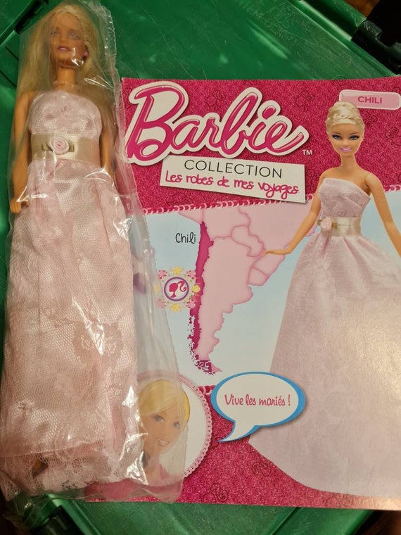 Collection Barbie robe de voyage , barbie avec son fascicule du