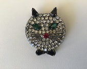 Vintage 1960 s Head of cat. Green eyes, metallic moustaches, red nose and black bow Gift for Her. Unique Cat Brooch