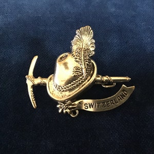 Antique Switzerland Pin Brooch. Hat, pickaxes Peacock feather Edelweiss.Silver tone metal Brooch.Antique Switzerland Pin Brooch.Gift for her