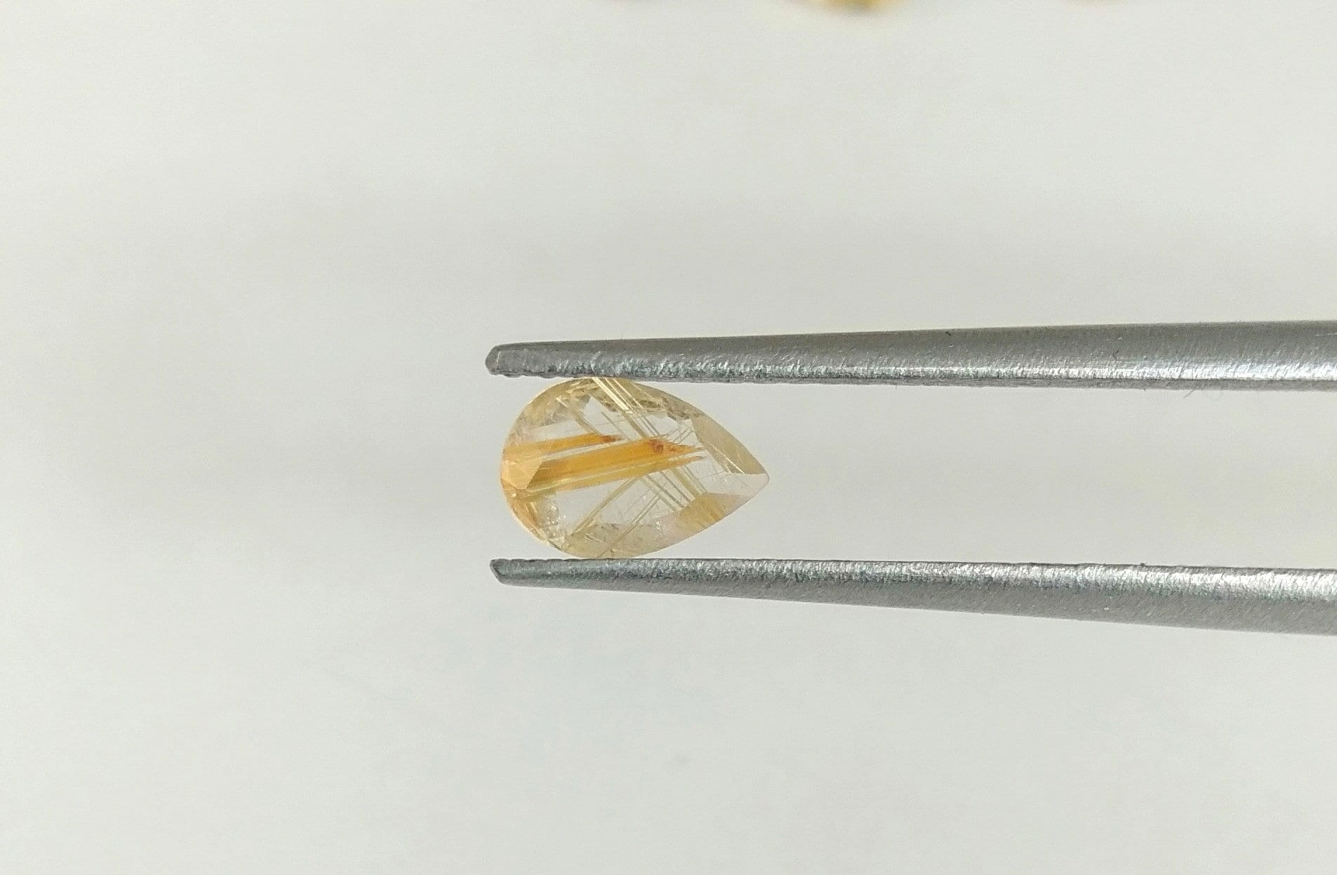 AAAゴールデンルチルクォーツペア：5 x 7 mmファセットルース