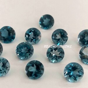 4 mm AAA Quality-Natural London Blue Topaz Round Faceted