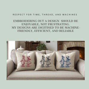 May include: Three square beige throw pillows on a sofa, each featuring an identical embroidered design of two children holding hands while wearing winter coats and hats. The embroidery colors are red, black, and blue on the respective pillows.