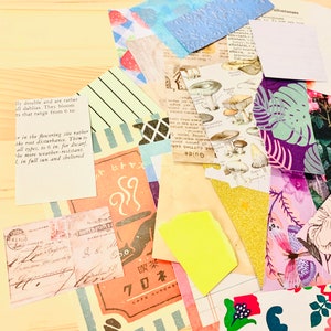 Peut inclure: Un ensemble de papiers color&eacute;s avec diff&eacute;rents motifs et designs. Certains papiers comportent du texte, dont une phrase japonaise, "喫茶 70ネ", qui se traduit par "Caf&eacute; 70".