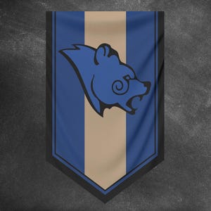 May include: A blue and beige banner with a black border and a stylized blue bear head with a swirl in its ear.