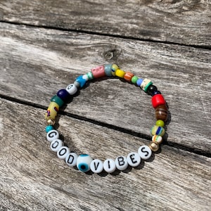 Good Vibes Bracelet-evil eye, vintage African trade beads, turquoise, ostrich egg shell, vulcanite, Druk beads