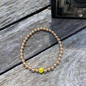 Smiley Face Bracelet- 5mm 14k Gold-filled beads and 6mm Glass Smiley Face Bead