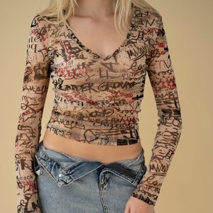 y2k iconic newspaper mesh crop top, graphic vintage multi lettering long sleeves top