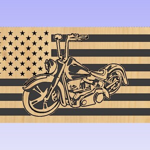 May include: A black and white silhouette of a motorcycle on a wood background with an American flag design. The motorcycle has a large front wheel and a smaller rear wheel.