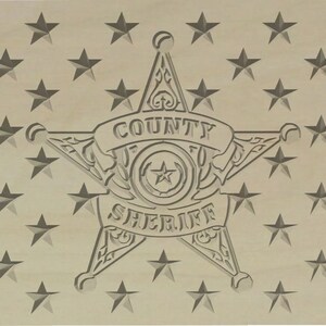 May include: A tan background with a five-pointed star sheriff's badge in the center. The badge has the words "COUNTY SHERIFF" on it. The background is filled with smaller five-pointed stars.