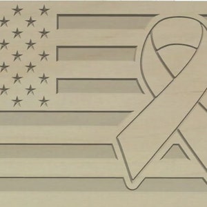 May include: A wooden carving depicting the American flag with a ribbon symbol. The flag design includes stars and stripes, with a ribbon overlay. The carving is in a natural wood tone, with detailed lines and shapes.