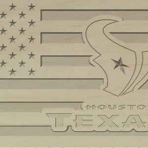 May include: A wooden American flag with the Houston Texans logo in the lower right corner. The logo is a star inside a bull's head with the words "HOUSTON TEXANS" below it.