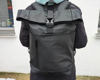 Toproll backpack made of rubber in black